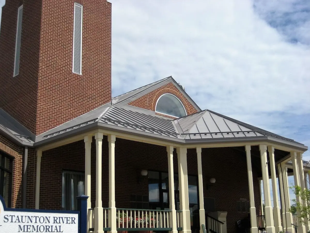 Skilled roofing craftsmen working on a residential roof in Downtown Greenville
